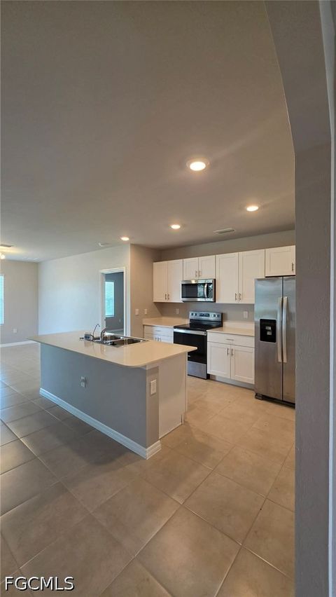 Tiny photo for 1437 NW 31st Place, Cape Coral, FL 33993 (MLS # 2026021682)