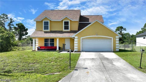 Photo of 1116 Crestwood Street E, Lehigh Acres, FL 33974 (MLS # 2026035562)