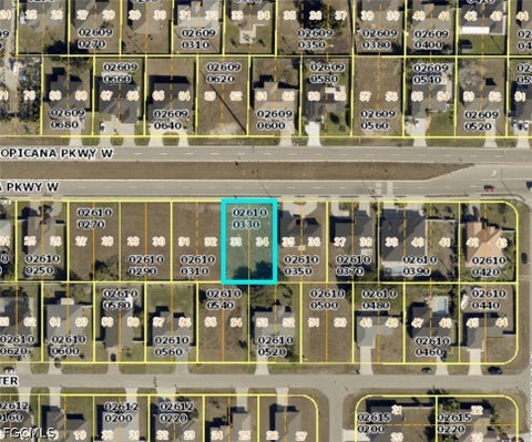 Photo of 26 Tropicana Parkway W, Cape Coral, FL 33993 (MLS # 2026025716)
