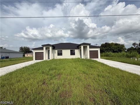Photo of 227 Ivan Avenue S, Lehigh Acres, FL 33973 (MLS # 2026031094)