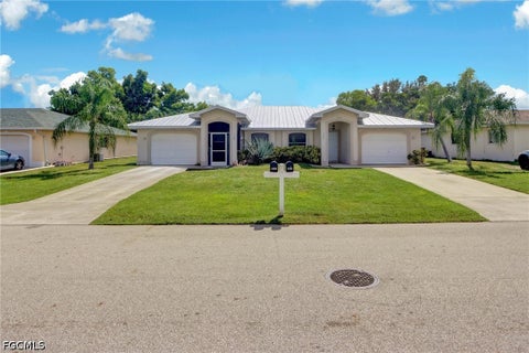 Photo of 1305 SE 8th Avenue, Cape Coral, FL 33990 (MLS # 2026035100)