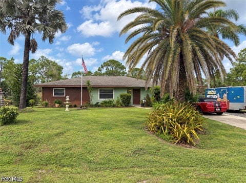 Photo of 325 Wellington Avenue, Lehigh Acres, FL 33936 (MLS # 2026039763)