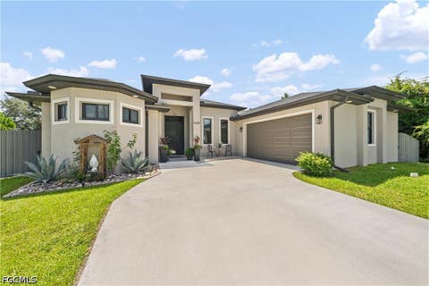 Tiny photo for 1405 Bruce Avenue S, Lehigh Acres, FL 33976 (MLS # 2026030902)