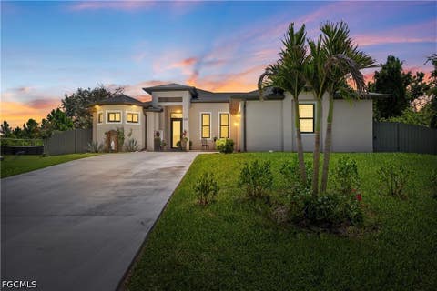 Photo of 1405 Bruce Avenue S, Lehigh Acres, FL 33976 (MLS # 2026030902)