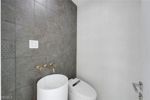 Tiny photo for 432 Burnt Store Road S, Cape Coral, FL 33991 (MLS # 2026027647)