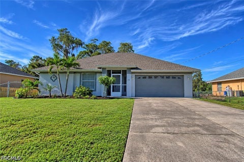 Photo of 424 La Perouse Street, Lehigh Acres, FL 33974 (MLS # 2026040686)