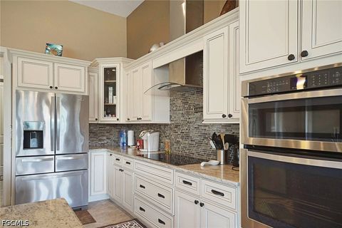 Tiny photo for 1502 SW 38th Street, Cape Coral, FL 33914 (MLS # 2026018708)
