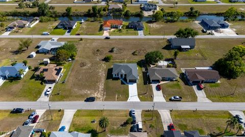 Tiny photo for 2124 NE 28th Street, Cape Coral, FL 33909 (MLS # 2026005640)