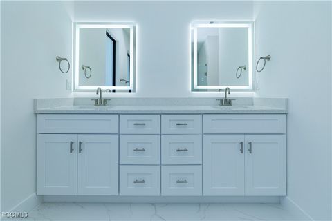 Tiny photo for 2124 NE 28th Street, Cape Coral, FL 33909 (MLS # 2026005640)