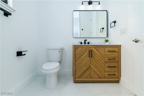 Tiny photo for 2124 NE 28th Street, Cape Coral, FL 33909 (MLS # 2026005640)