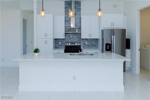 Tiny photo for 2124 NE 28th Street, Cape Coral, FL 33909 (MLS # 2026005640)