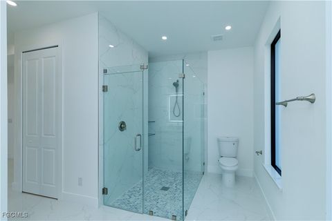 Tiny photo for 2124 NE 28th Street, Cape Coral, FL 33909 (MLS # 2026005640)