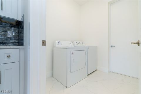 Tiny photo for 2124 NE 28th Street, Cape Coral, FL 33909 (MLS # 2026005640)