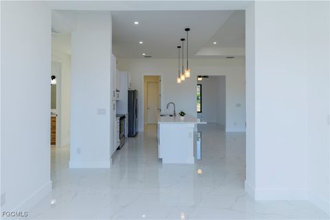 Tiny photo for 2124 NE 28th Street, Cape Coral, FL 33909 (MLS # 2026005640)