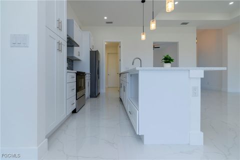 Tiny photo for 2124 NE 28th Street, Cape Coral, FL 33909 (MLS # 2026005640)