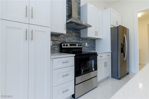 Tiny photo for 2124 NE 28th Street, Cape Coral, FL 33909 (MLS # 2026005640)