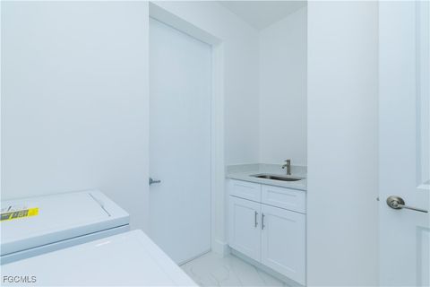 Tiny photo for 2124 NE 28th Street, Cape Coral, FL 33909 (MLS # 2026005640)