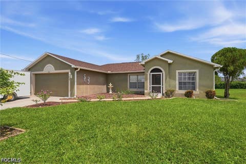 Photo of 4112 10th Street W, Lehigh Acres, FL 33971 (MLS # 2026033206)