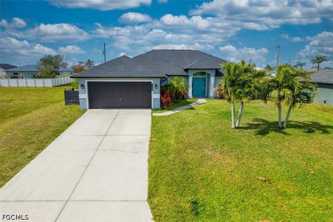 Photo of 1154 NW 6th Place, Cape Coral, FL 33993 (MLS # 2026035154)