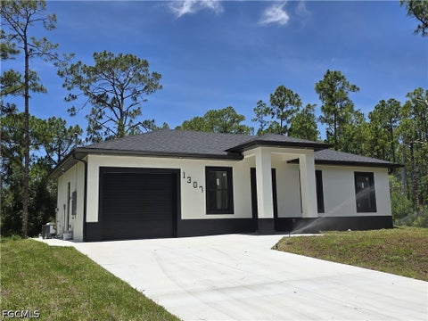 Tiny photo for 1307 Monroe Avenue, Lehigh Acres, FL 33972 (MLS # 2026026913)