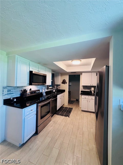 Tiny photo for 5598 Boynton Lane, Fort Myers, FL 33919 (MLS # 2026039553)