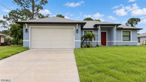 Photo of 3602 65th Street W, Lehigh Acres, FL 33971 (MLS # 2026040985)