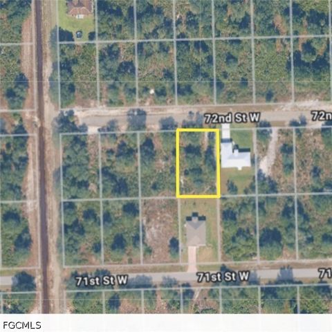 Photo of 2521 72nd Street W, Lehigh Acres, FL 33971 (MLS # 2026020426)