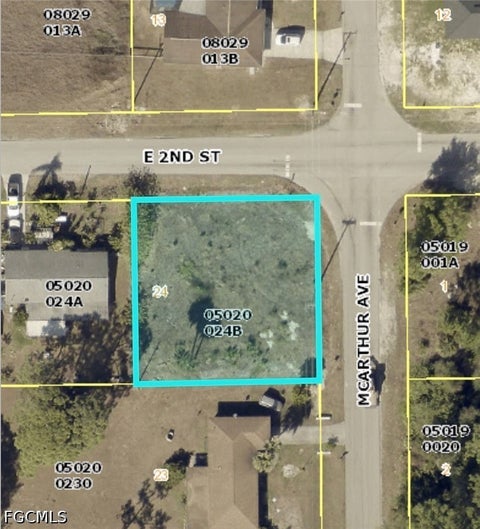 Photo of 2706 E 2nd Street, Lehigh Acres, FL 33936 (MLS # 2026039534)