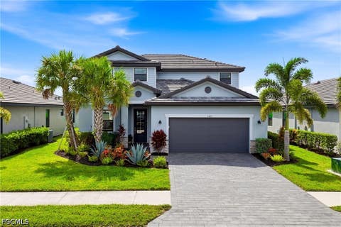 Photo of 11401 Timber Creek Drive, Fort Myers, FL 33913 (MLS # 2026030995)