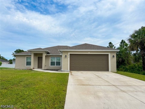 Photo of 2614 27th Street W, Lehigh Acres, FL 33971 (MLS # 2026040448)