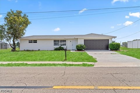 Photo of 14 Richmond Avenue N, Lehigh Acres, FL 33936 (MLS # 2026020110)