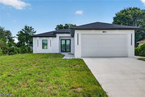 Photo of 3814 34th Street SW, Lehigh Acres, FL 33976 (MLS # 2026030784)