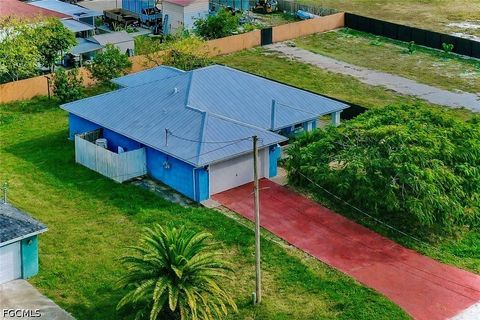 Tiny photo for 711 Downer Avenue S, Lehigh Acres, FL 33974 (MLS # 2026018951)