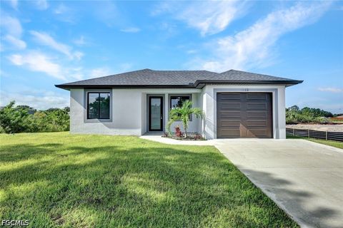 Photo of 312 Progress Avenue, Lehigh Acres, FL 33974 (MLS # 2026021989)