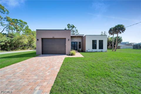 Photo of 446 Skyland Lane, Port Charlotte, FL 33953 (MLS # 2026020319)