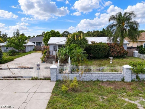 Photo of 4702 Olive Avenue S, Lehigh Acres, FL 33976 (MLS # 2026042554)