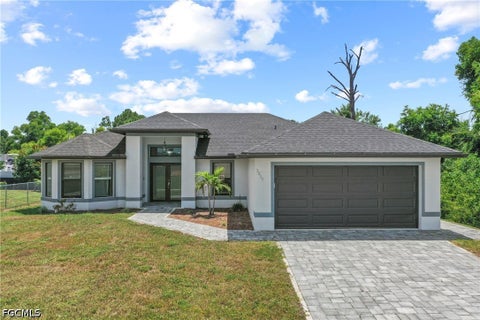 Photo of 3805 6th Street W, Lehigh Acres, FL 33971 (MLS # 2026036137)