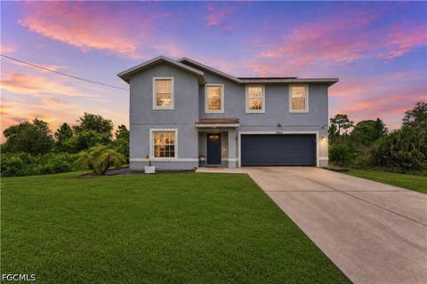 Photo of 904 8th Avenue, Lehigh Acres, FL 33972 (MLS # 2026035224)