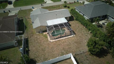 Photo of 915 SE 20th Street, Cape Coral, FL 33990 (MLS # 2026035335)