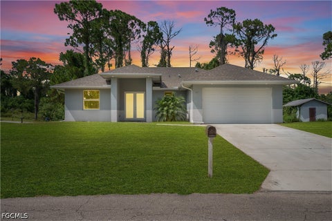 Photo of 1901 E 7th Street, Lehigh Acres, FL 33936 (MLS # 2026035554)