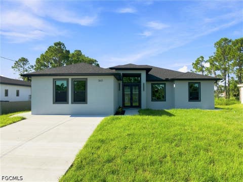 Photo of 3613 2nd Street SW, Lehigh Acres, FL 33976 (MLS # 2026034863)