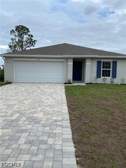Photo of 2213 NE 33rd Street, Cape Coral, FL 33909 (MLS # 2026018666)