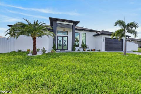 Photo of 1005 NE 1st Place, Cape Coral, FL 33909 (MLS # 2026033908)