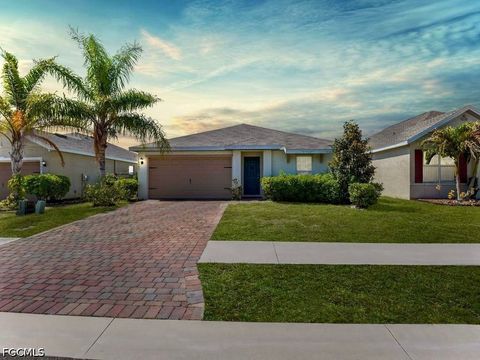 Photo of 10545 Crossback Lane, Lehigh Acres, FL 33936 (MLS # 2026018796)