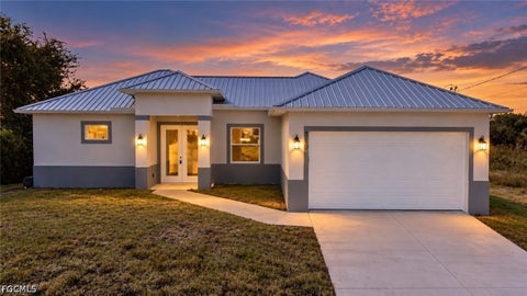 Photo of 510 Kingsbury Lane, Lehigh Acres, FL 33974 (MLS # 2026039683)