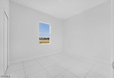 Tiny photo for 510 Kingsbury Lane, Lehigh Acres, FL 33974 (MLS # 2026039683)