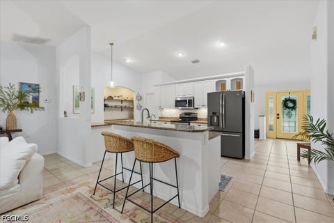 Tiny photo for 1939 SE 17th Place, Cape Coral, FL 33990 (MLS # 2026037676)