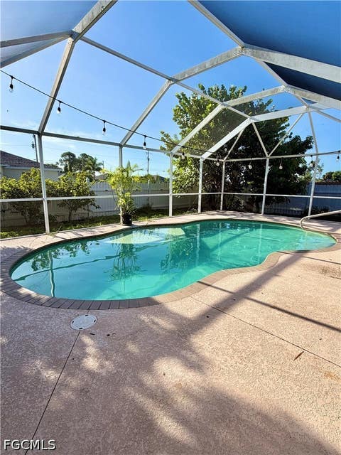Tiny photo for 4017 NE 10th Avenue, Cape Coral, FL 33909 (MLS # 2026033790)