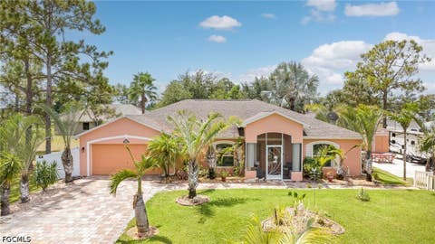 Photo of 2515 15th Street W, Lehigh Acres, FL 33971 (MLS # 2026035633)