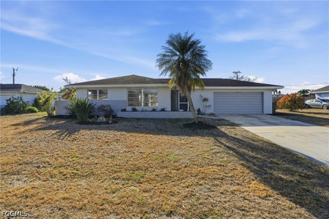 Photo of 312 Hollywood Street, Lehigh Acres, FL 33936 (MLS # 2026038585)